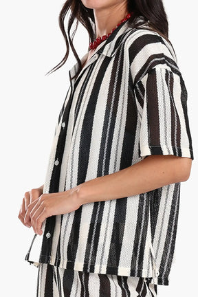 طقم أبيض وأسود للشاطئ