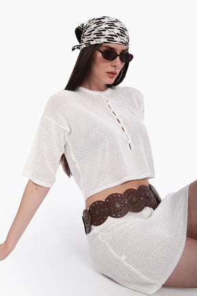 طقم تريكو من بلوزة قصيرة وجيب