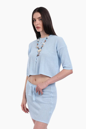 طقم تريكو من بلوزة قصيرة وجيب